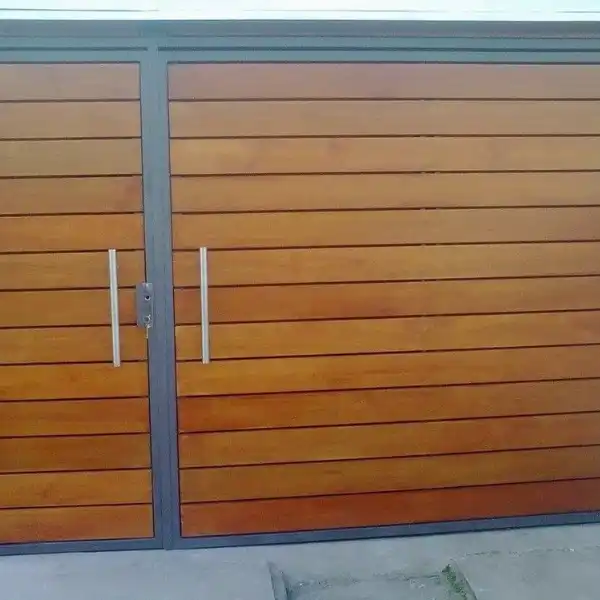 portones con puerta incluida - empresa de herreria